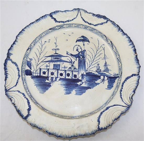 A pair of pearlware blue and white dishes and another similar pearlware dish, late 18th century, both diam. 35.5cm